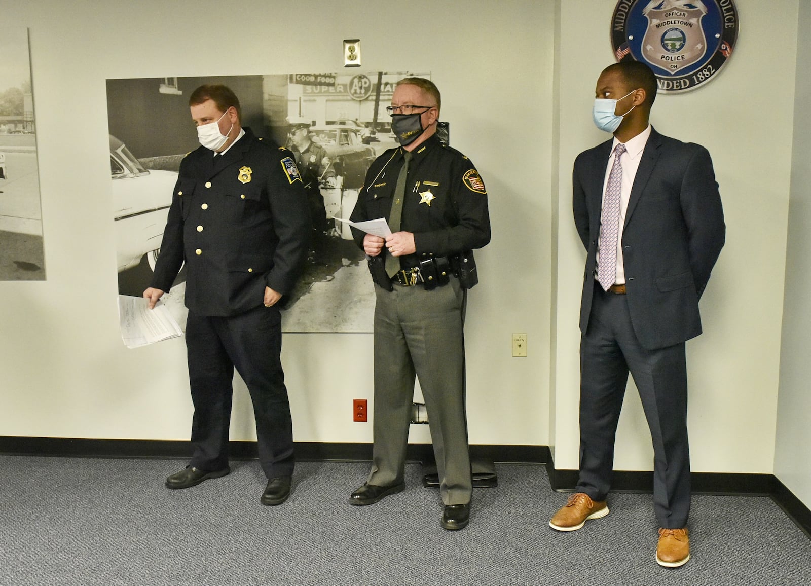 Photos from the news conference regarding the death of 6-year-old James Robert Hutchinson of Middletown. NICK GRAHAM / STAFF