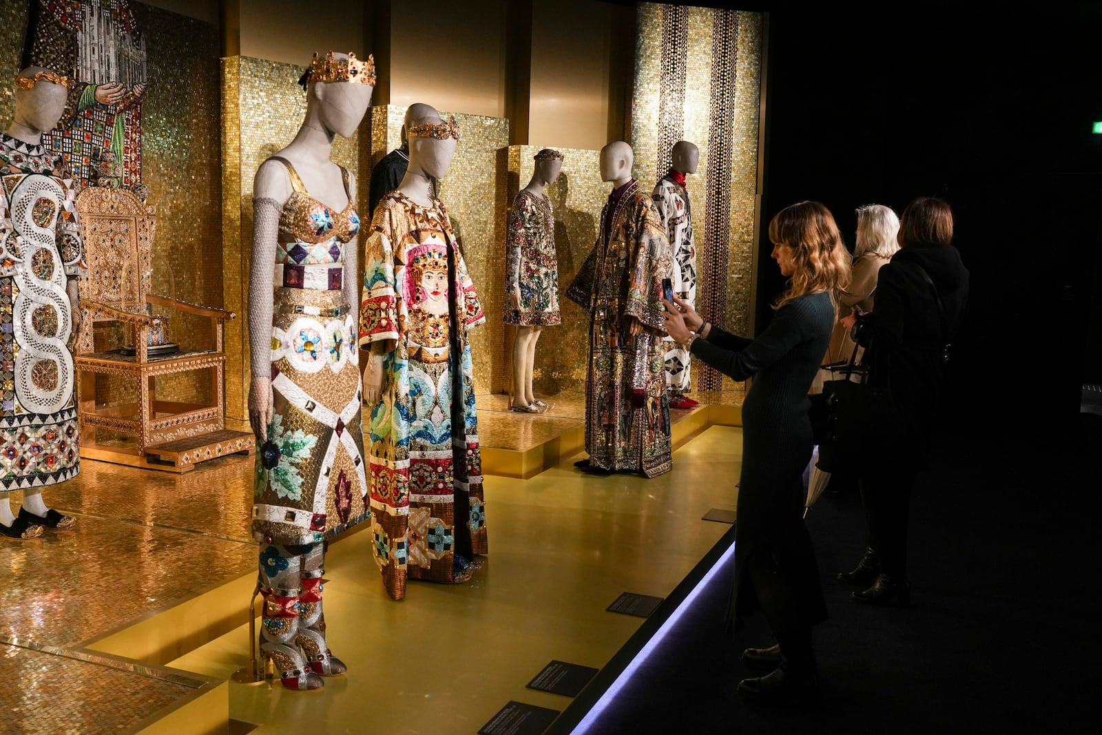 Creations are displayed during the exhibition "From the Heart to the Hands: Dolce&Gabbana" at the Grand Palais, in Paris, Thursday, Jan. 9, 2025. (AP Photo/Thibault Camus)