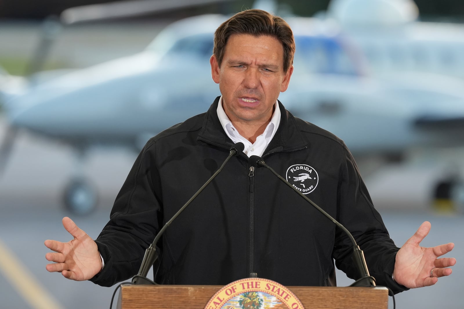 Florida Gov. Ron DeSantis speaks during a press conference on immigration enforcement at a U.S. Customs and Border Protection hangar on Homestead Air Force Base, Wednesday, Feb. 26, 2025, in Homestead, Fla. (AP Photo/Rebecca Blackwell)