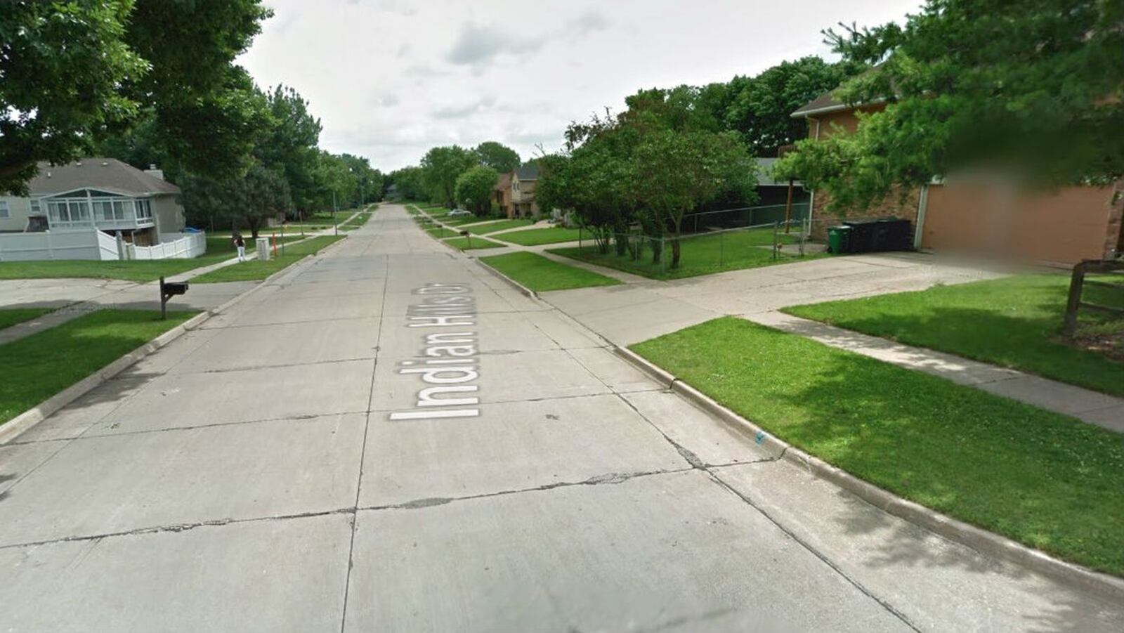 Pictured in a June 2011 Street View image is the stretch of Indian Hills Drive in Clive, Iowa, where Nicole Marie Poole Franklin, 42, of Des Moines, is accused of purposely striking a 14-year-old Hispanic girl with her car Dec. 9, 2019. Franklin is charged with attempted murder.