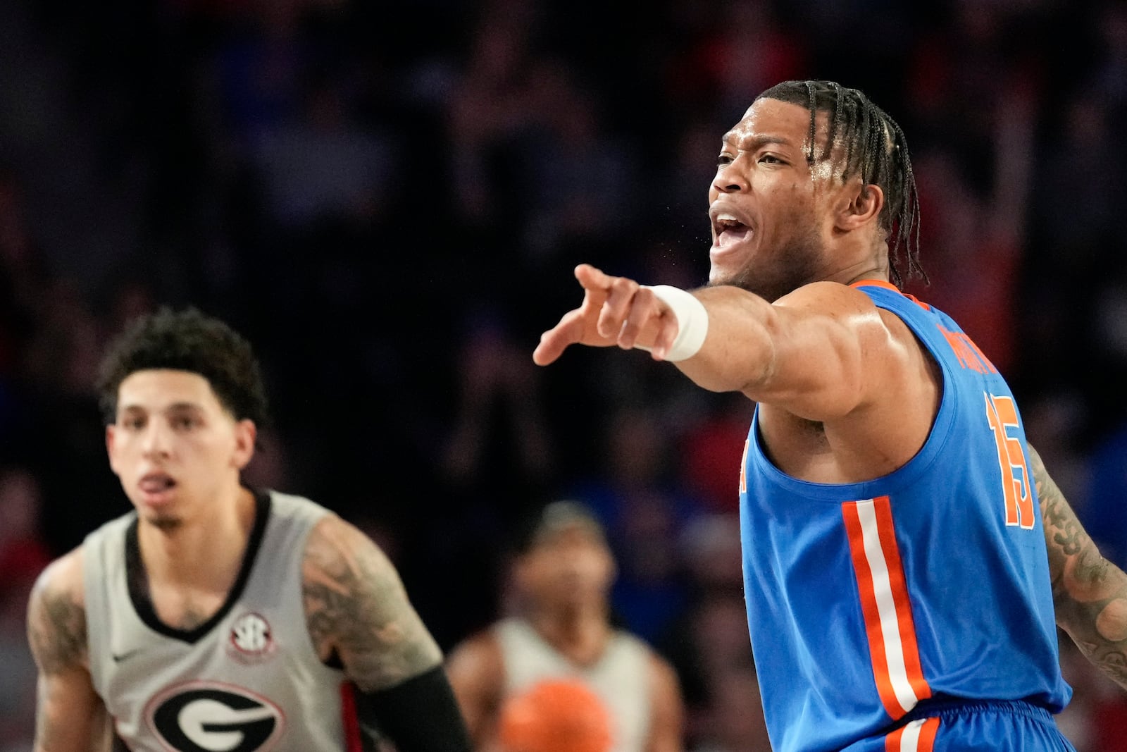 Florida guard Alijah Martin (15) yells towards his teammates during an NCAA college basketball game against Georgia, Tuesday, Feb. 25, 2025, in Athens, Ga. (AP Photo/Brynn Anderson)