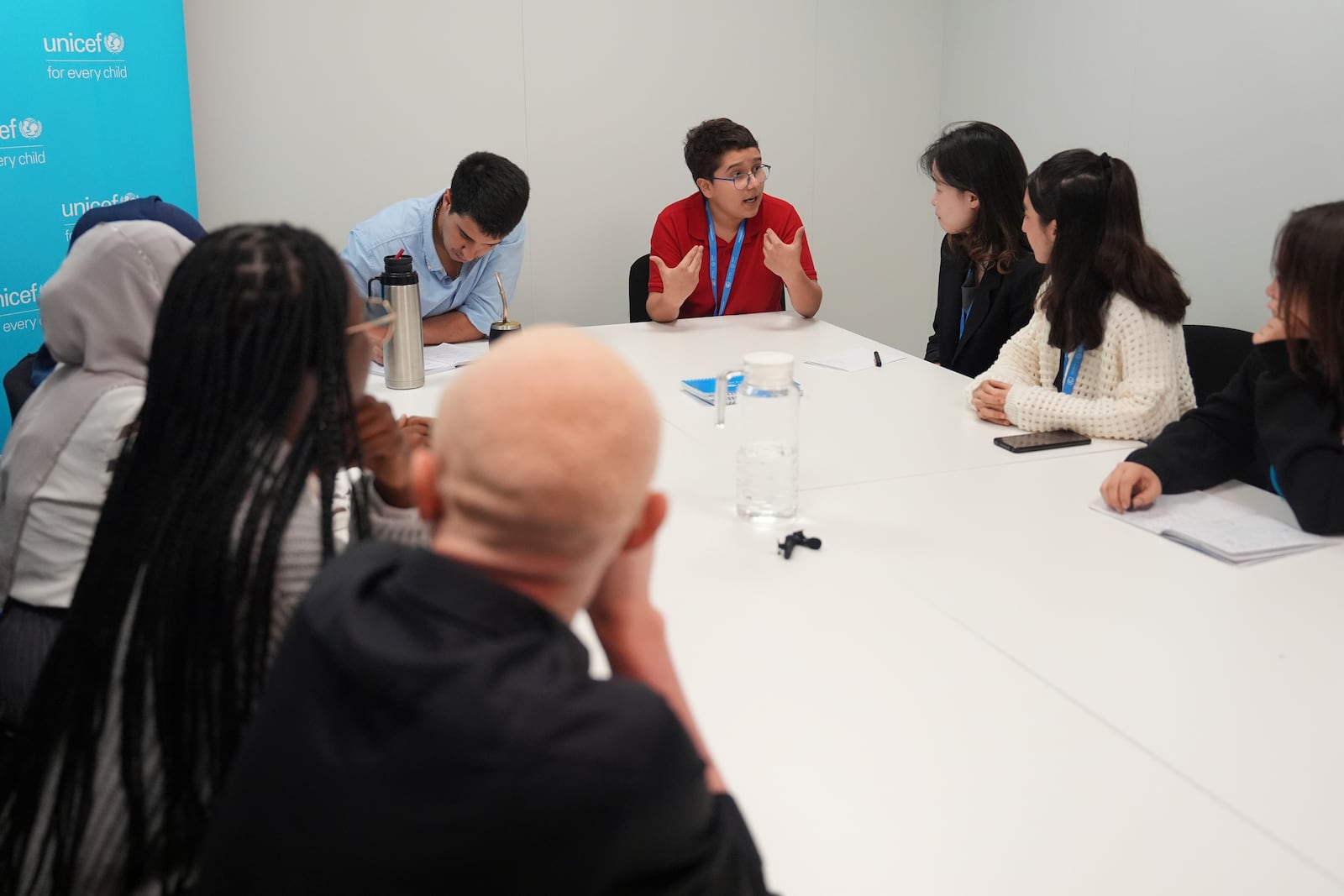 Francisco Vera Manzanares, 15, a climate activist from Colombia, speaks with other youth activists during a forum with young activists, Tuesday, Nov. 12, 2024, at the COP29 U.N. Climate Summit in Baku, Azerbaijan. (AP Photo/Joshua A. Bickel)