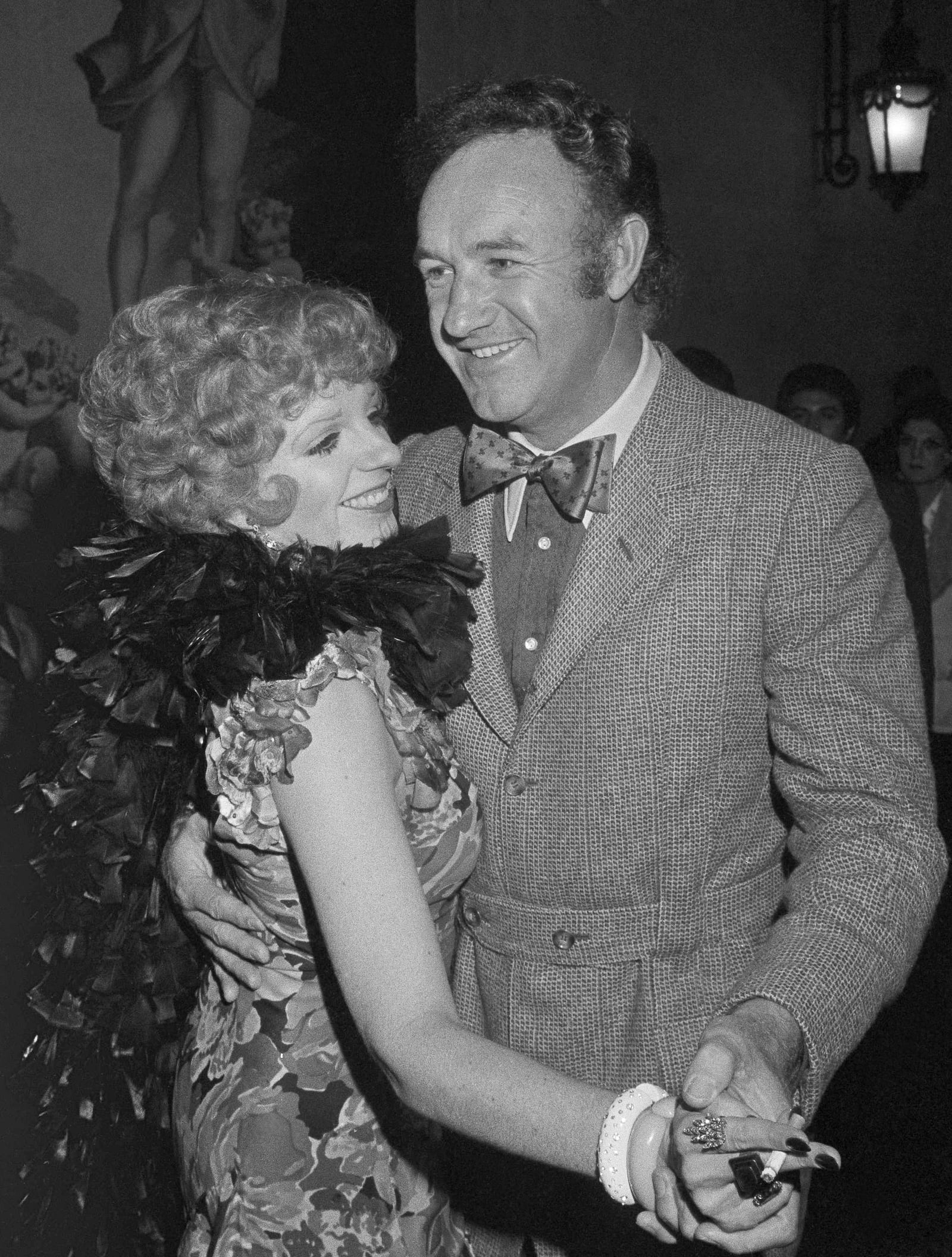 FILE - Liza Minnelli and Gene Hackman dance at the University Club, Wednesday, June 26, 1975, in Mexico City, where they are filming the movie "Lucky Lady." (AP Photo/Hem, File)