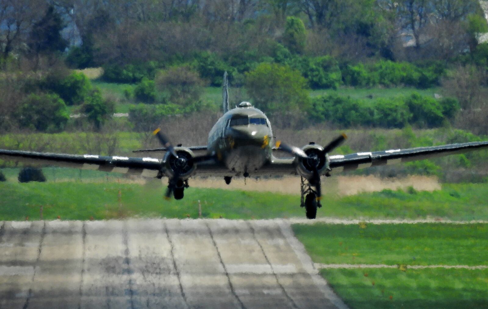 That’s All, Brother, a C-47 piloted by Lt. Col. John Donalson, arrived at Butler County Regional Airport Friday, April 16 for a three-day visit with tours and rides available. The historic WWII C-47 aircraft led over 800 C-47’s over the drop zones of Normandy, France on D-Day on June 6th, 1944. NICK GRAHAM / STAFF