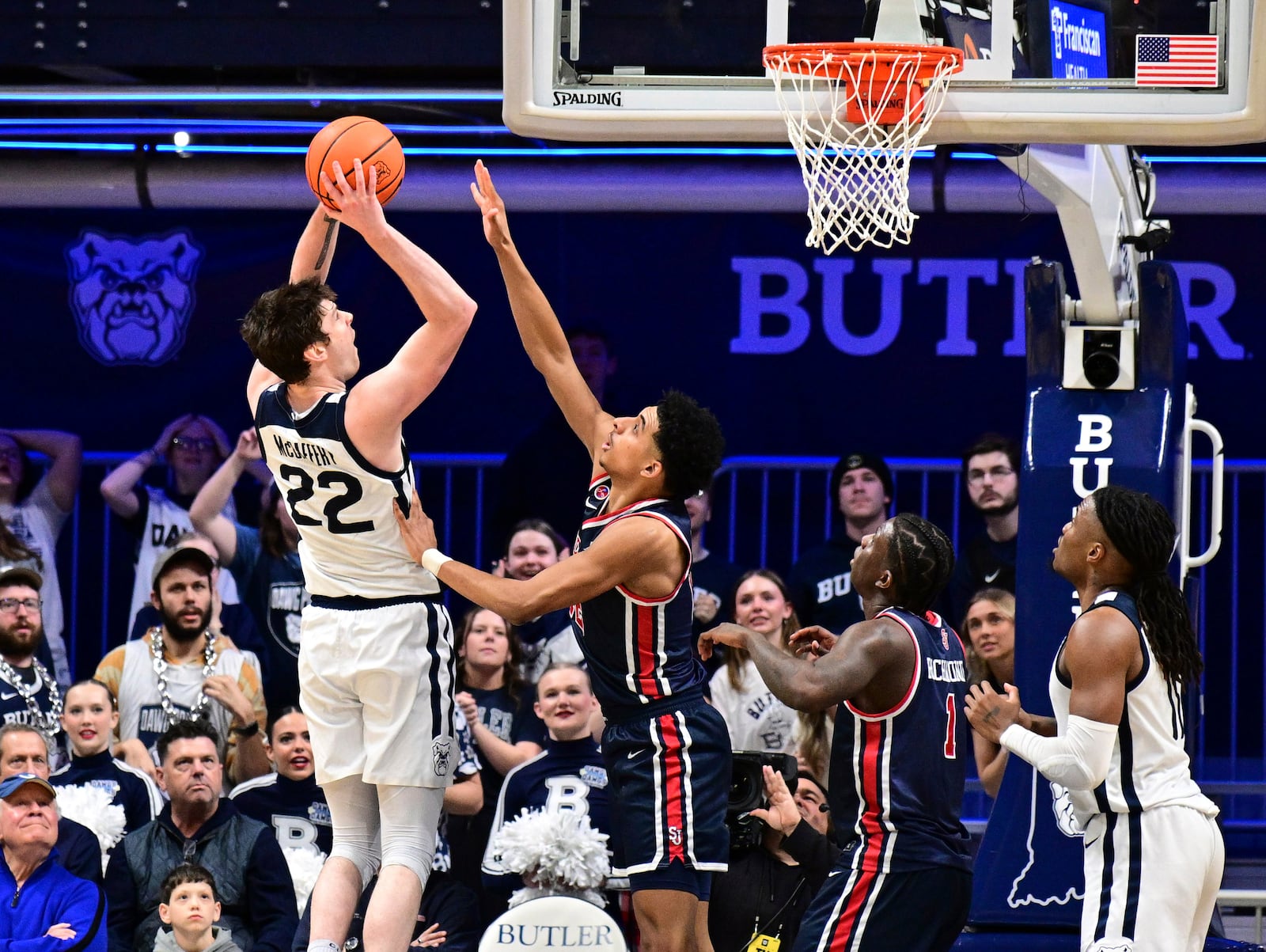 Butler forward Patrick McCaffery (22) shoots the ball over St. John's guard RJ Luis Jr. during the second half of an NCAA college basketball game, Wednesday, Feb. 26, 2025, in Indianapolis, Ind. (AP Photo/Marc Lebryk)