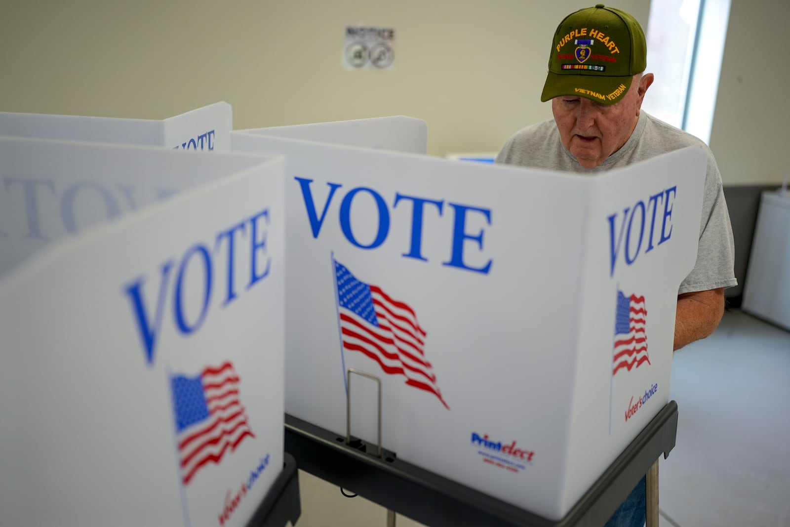 Ronnie Brookshire votes, Tuesday, Nov. 5, 2024, in Canton, N.C. (AP Photo/George Walker IV)