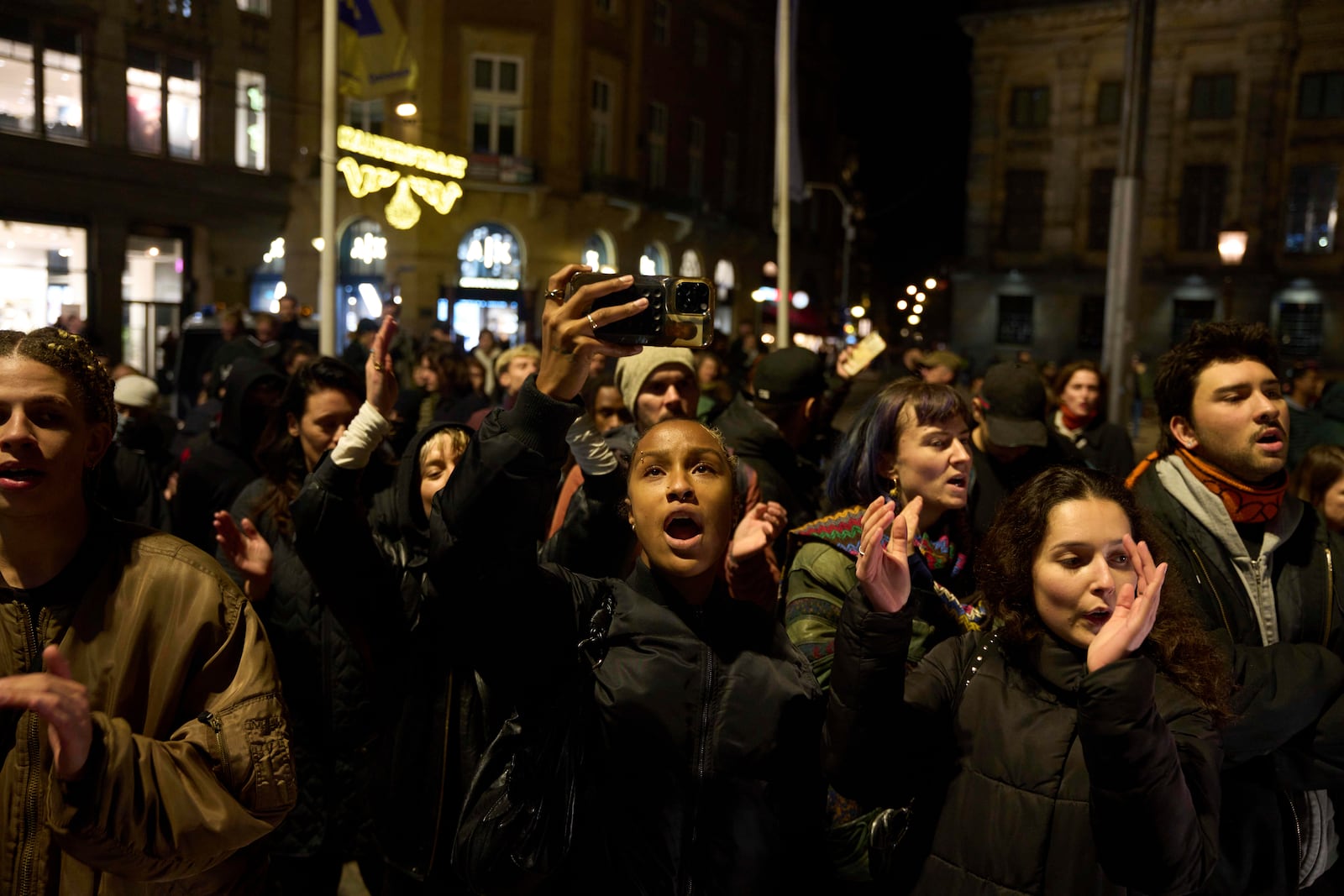 Pro-Palestinian supporters protest in Amsterdam, Netherlands, Wednesday, Nov. 13, 2024, despite a city ban on such gatherings. (AP Photo/Bram Janssen)