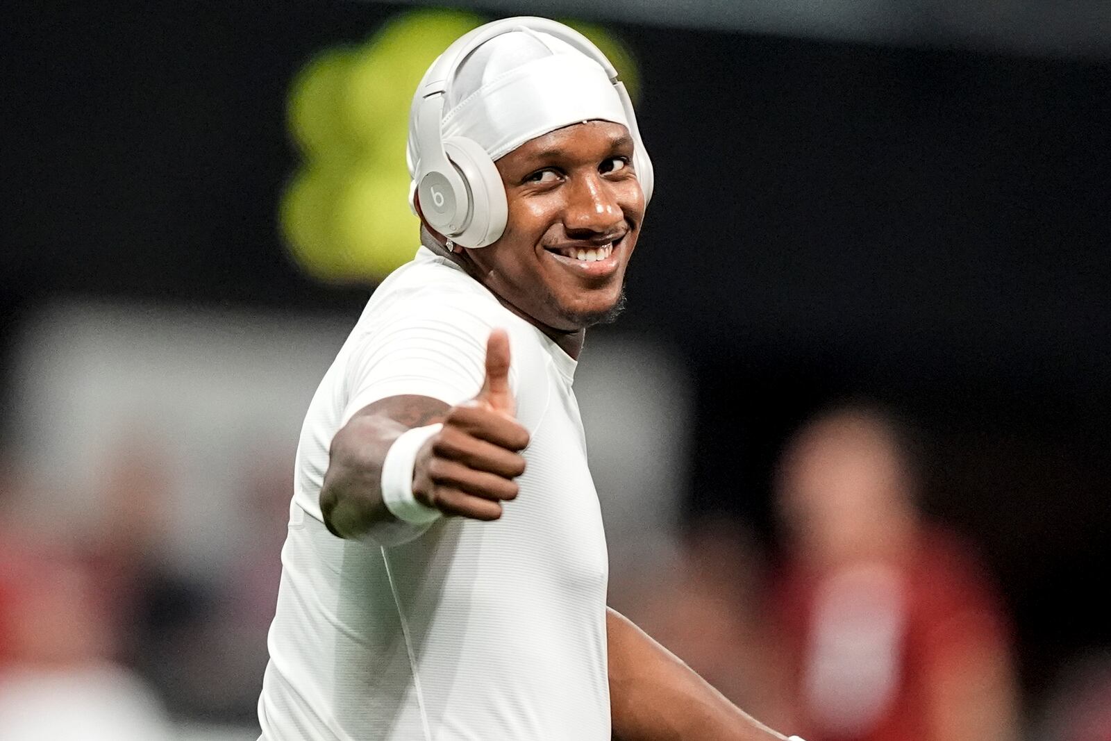 FILE - Atlanta Falcons quarterback Michael Penix Jr. warms up before an NFL football game between the Atlanta Falcons and the Kansas City Chiefs, Sunday, Sept. 22, 2024, in Atlanta. (AP Photo/Brynn Anderson, File)