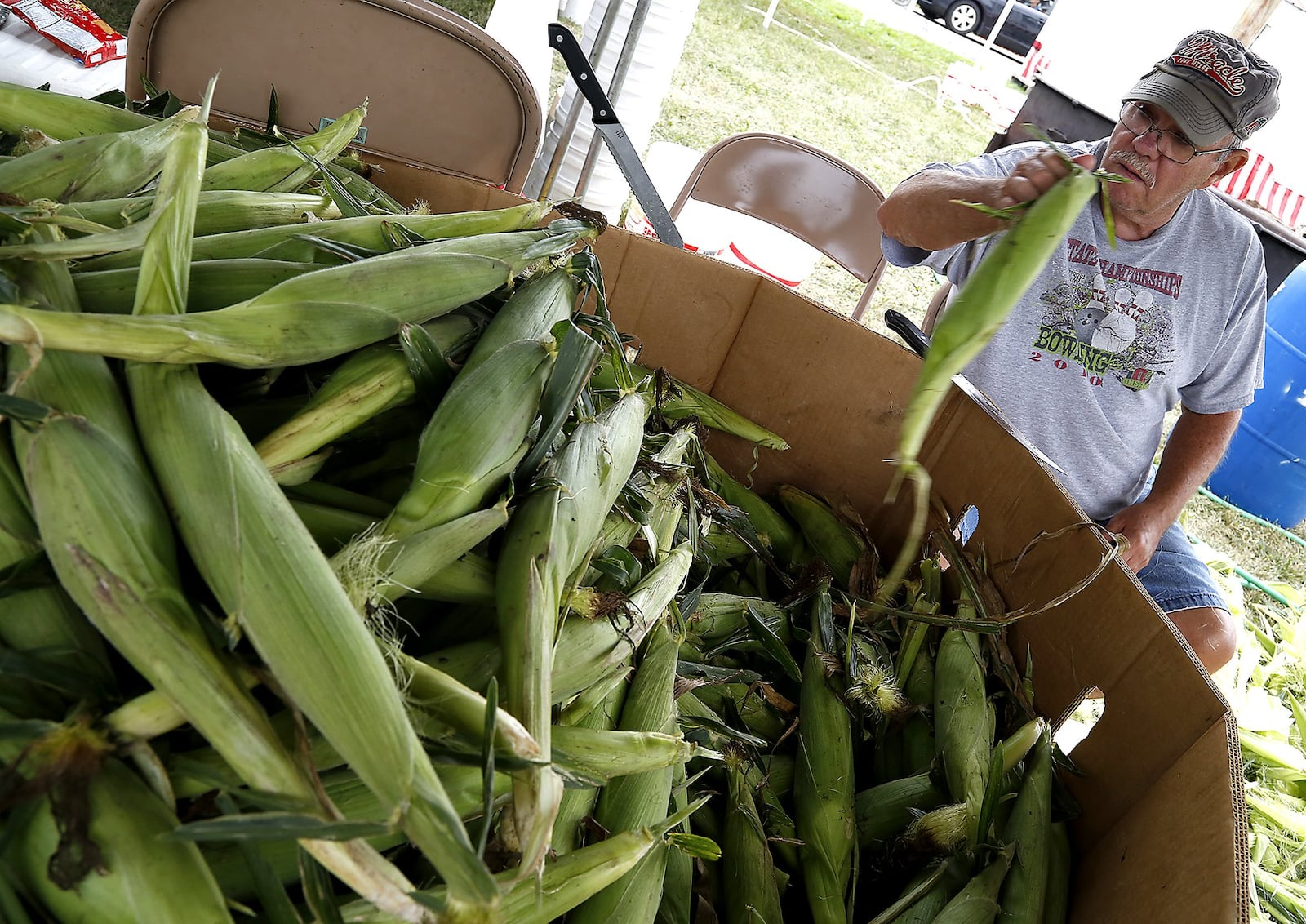 Scenes from a past South Vienna Corn Festival. This year’s event will take place Sept. 8-10. BILL LACKEY/STAFF