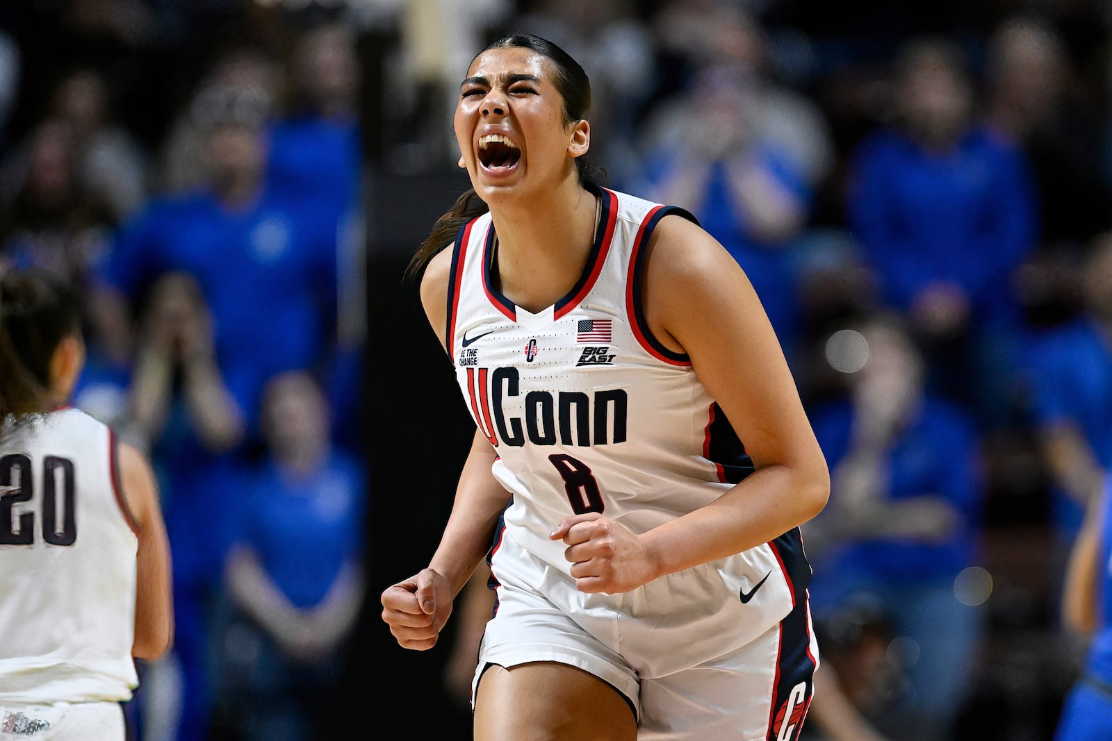 UConn center Jana El Alfy (8) reacts after making a basket during the first half of an NCAA college basketball game against Creighton in the finals of the Big East Conference tournament, Monday, March 10, 2025, in Uncasville, Conn. (AP Photo/Jessica Hill)