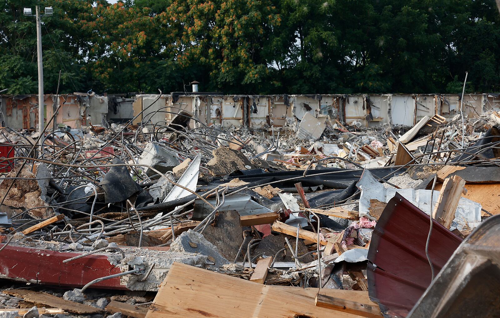 The former Villager Inn at 1715 W. North St. was demolished Saturday, Aug. 19. The city had purchased the building for $1.7 million to convert into a homeless shelter, but water damage, vandalism and a fire led the city to tear down the hotel. BILL LACKEY/STAFF