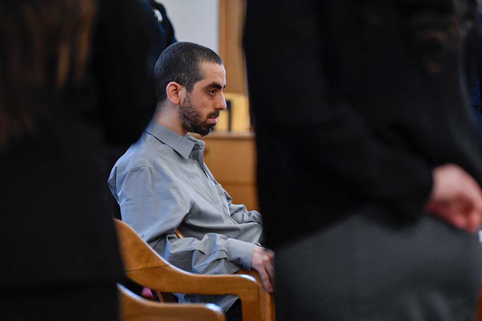 Hadi Matar, accused of repeatedly stabbing Salman Rushdie as the renowned author was being introduced for a lecture in western New York, sits in court during his attempted murder trial, Thursday, Feb. 20, 2025, in Mayville, N.Y. (AP Photo/Adrian Kraus)