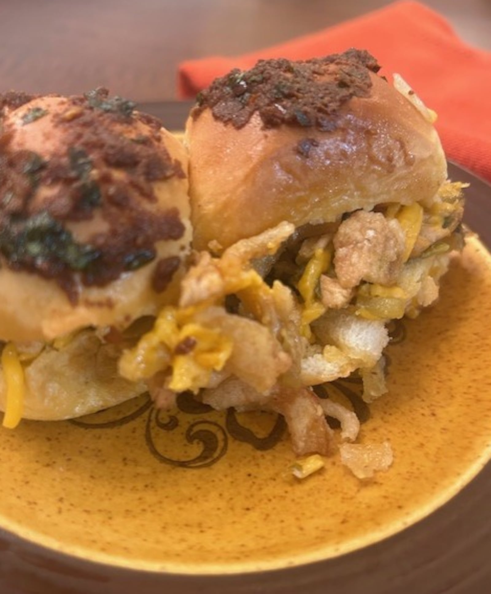 Cowgirl Chicken Sliders are full of flavor from green chiles and jalapeño, sharp cheddar cheese and fried onions. JANA COLLIER/CONTRIBUTED