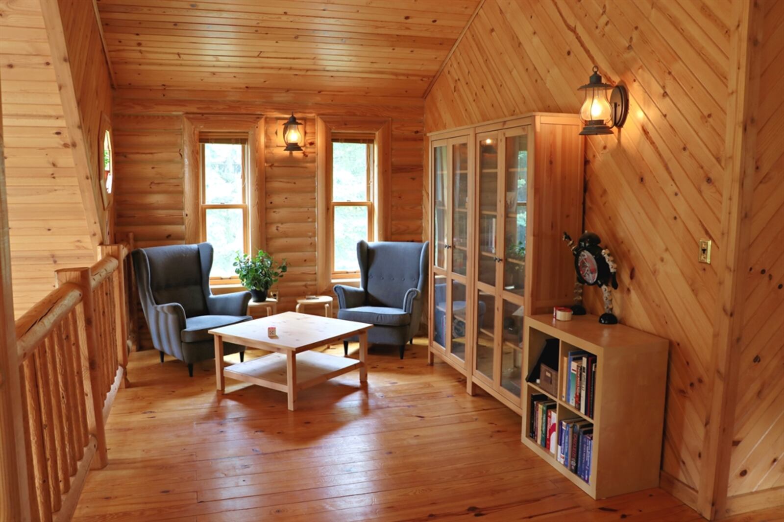 Upstairs, the loft has room for a study and sitting area. 