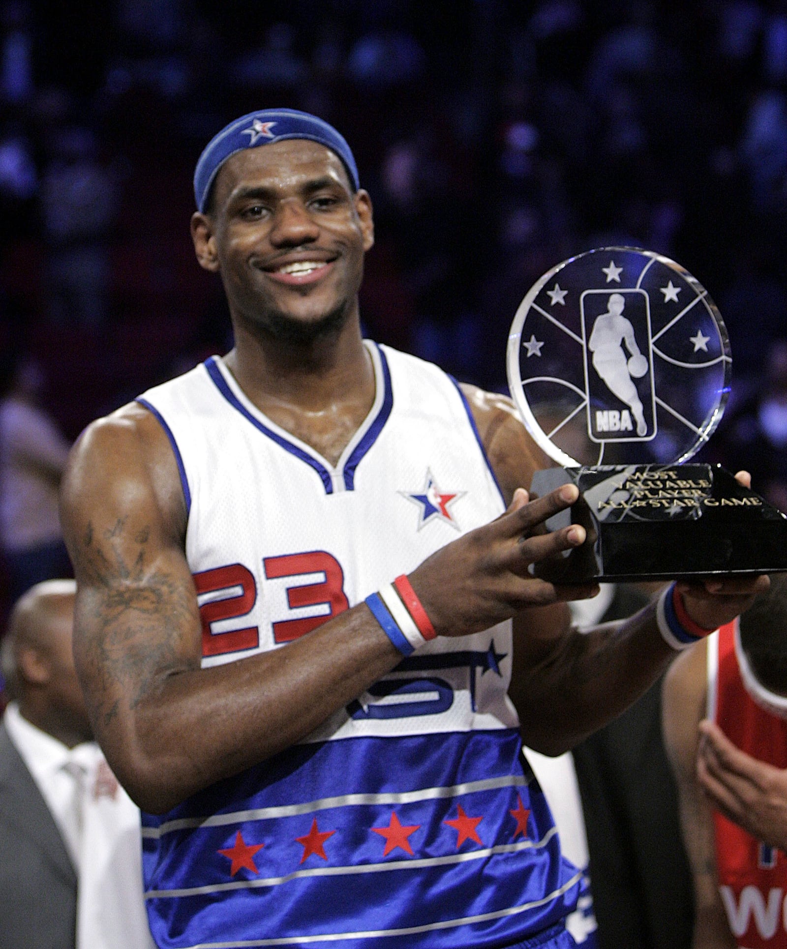 FILE - Cleveland Cavaliers LeBron James displays the MVP trophy after the the NBA All-Star basketball game in Houston, Sunday, Feb 19, 2006. The East beat the West, 122-120. (AP Photo/Sue Ogrocki, File)