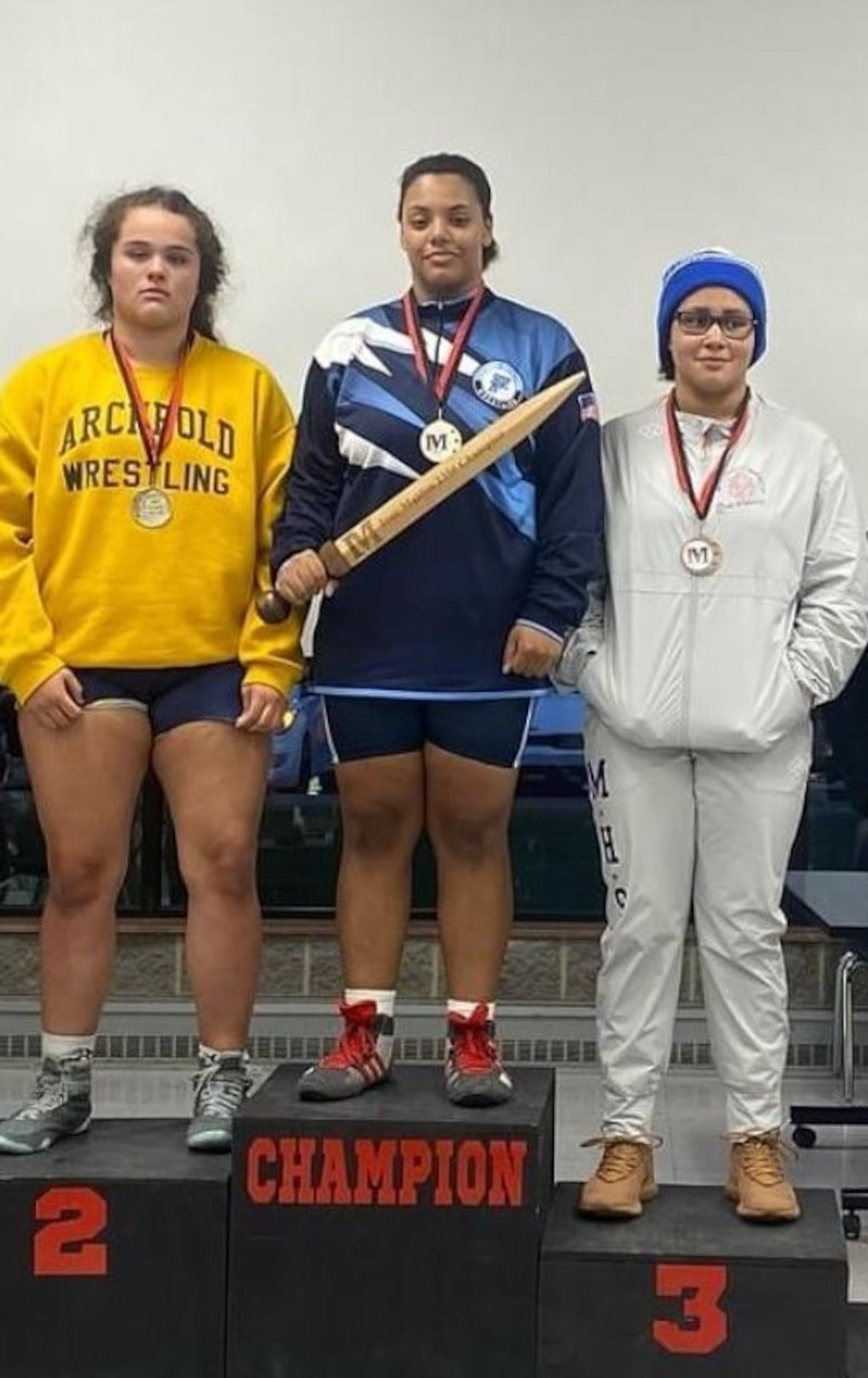 Fairborn’s Akiaya Rhinehart (with sword) when she won the Iron Maiden Tournament in Bellefontaine. She finished her senior year as the Division I state runner up in the heavyweight division and had a 42-2 record. CONTRIBUTED