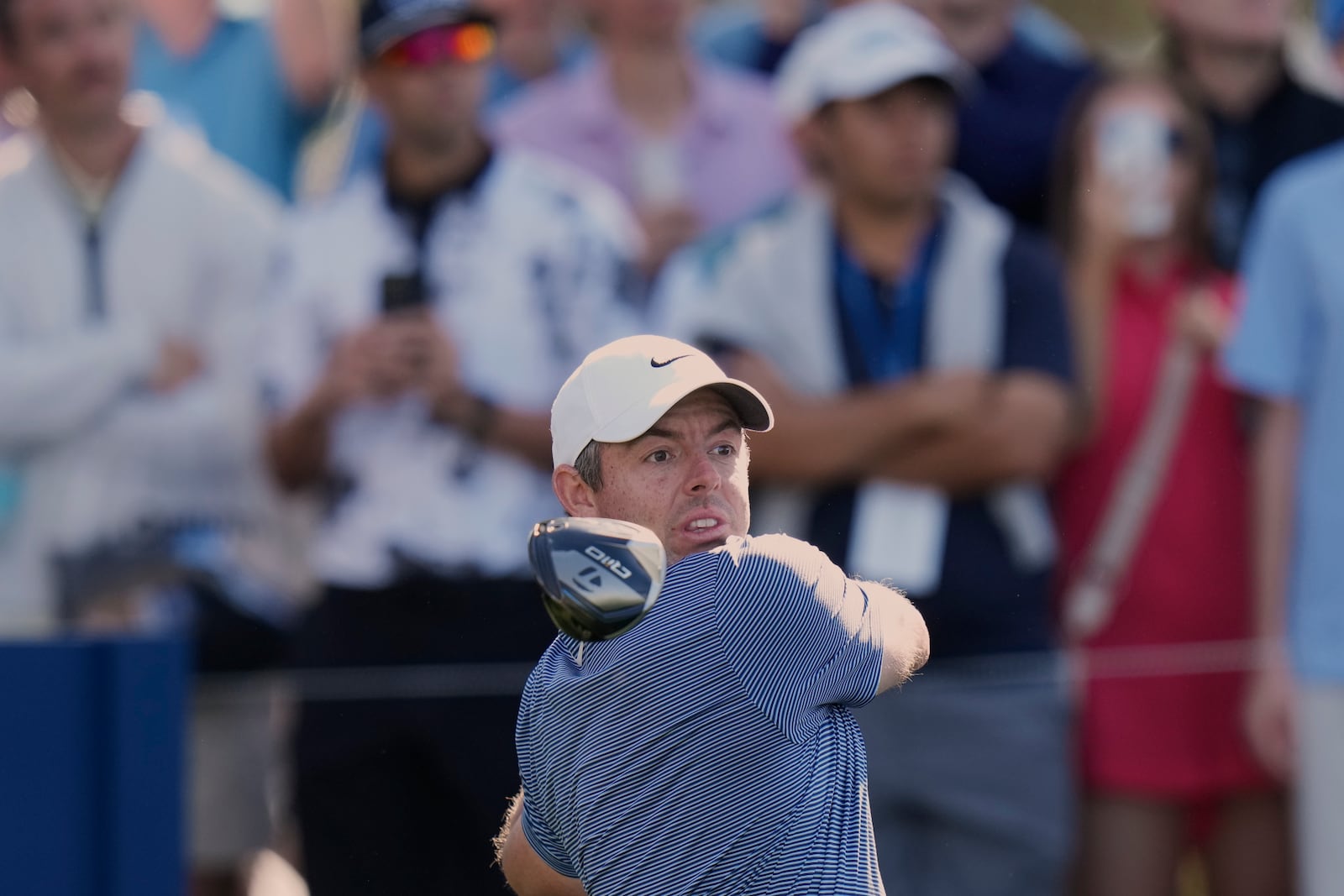 Rory McIlroy watches his tee shot on the 12th hole during the first round of The Players Championship golf tournament Thursday, March 13, 2025, in Ponte Vedra Beach, Fla. (AP Photo/Chris O'Meara)