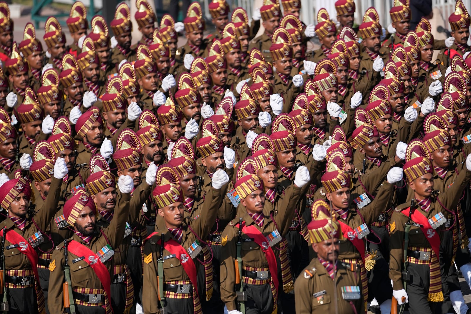 Indian defense forces march through the ceremonial Kartavya Path boulevard during India's Republic Day parade celebrations in New Delhi, India, Sunday, Jan. 26, 2025. (AP Photo/Channi Anand)