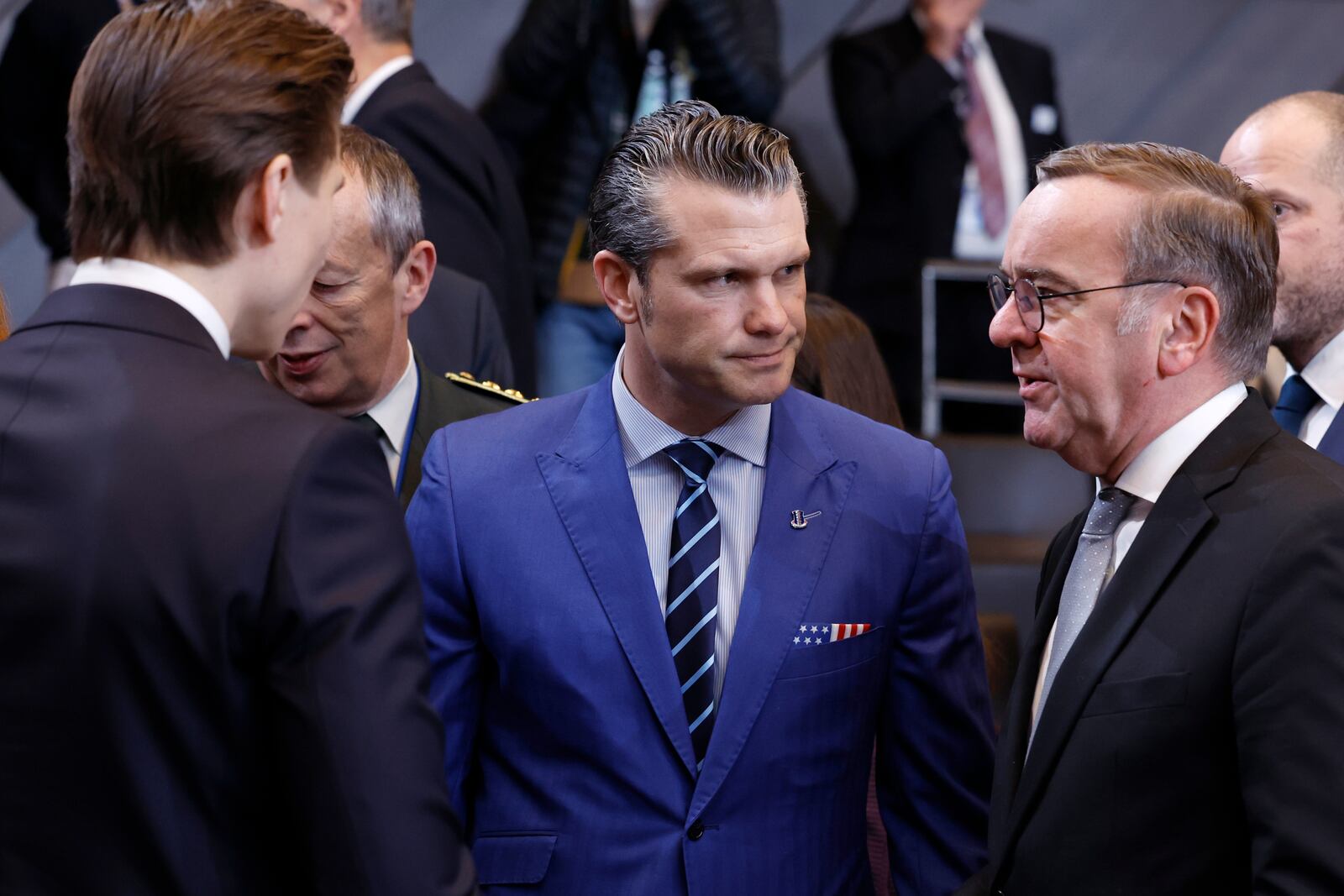 United States Secretary of Defense Pete Hegseth, center, speaks with Germany's Defense Minister Boris Pistorius, right, and Finland's Defense Minister Antti Hakkanen, left, during a meeting of the North Atlantic Council in defense ministers format at NATO headquarters in Brussels, Thursday, Feb. 13, 2025. (AP Photo/Geert Vanden Wijngaert)