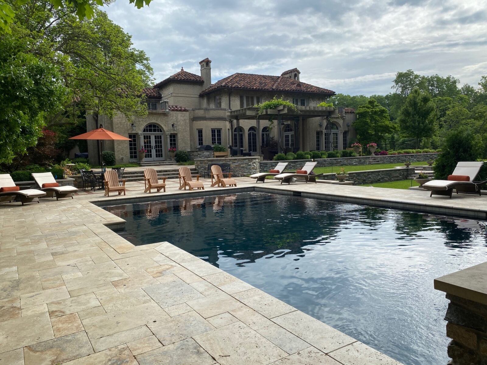 This Tuscan Retreat is featured on the Garden Club of Dayton tour. Built in 1927, the Italianate Revival home is surrounded by more than an acre of landscaped grounds that feature a pool and natural waterfall. CONTRIBUTED