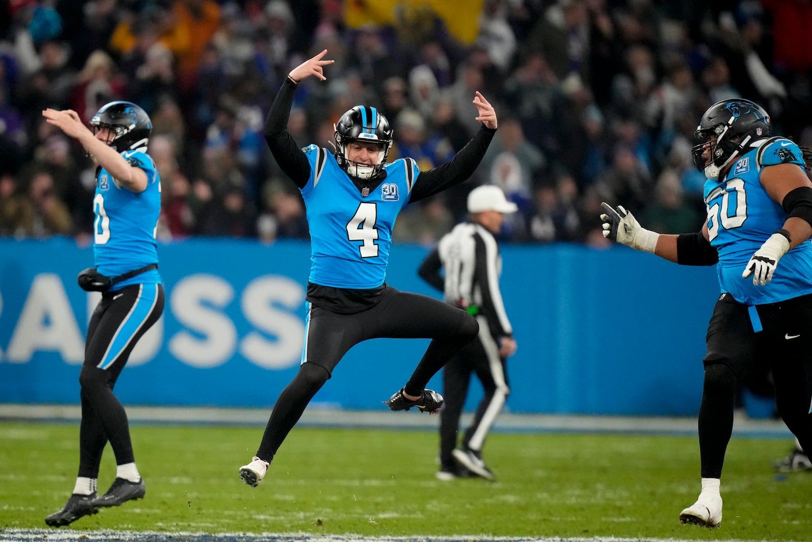 Carolina Panthers kicker Eddy Pineiro celebrates after kicking the game-winning field goal in overtime against New York Giants during an NFL football game, Sunday, Nov. 10, 2024, in Munich, Germany. (AP Photo/Matthias Schrader)