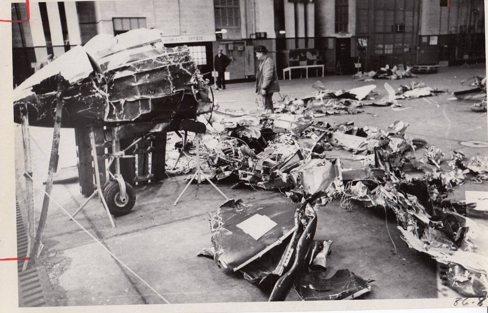 Investigators look over the plane crash debris in rural Champaign County on March 9, 1967. Archive photos