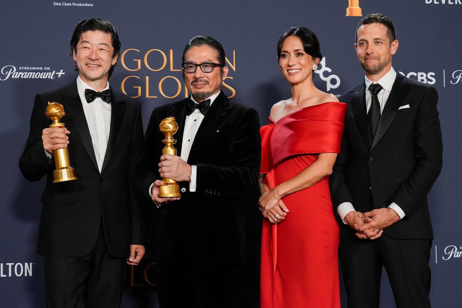 Tadanobu Asano, from left, Hiroyuki Sanada, Rachel Kondo and Justin Marks pose in the press room with the award for best television series - drama for "Shogun" during the 82nd Golden Globes on Sunday, Jan. 5, 2025, at the Beverly Hilton in Beverly Hills, Calif. (AP Photo/Chris Pizzello)