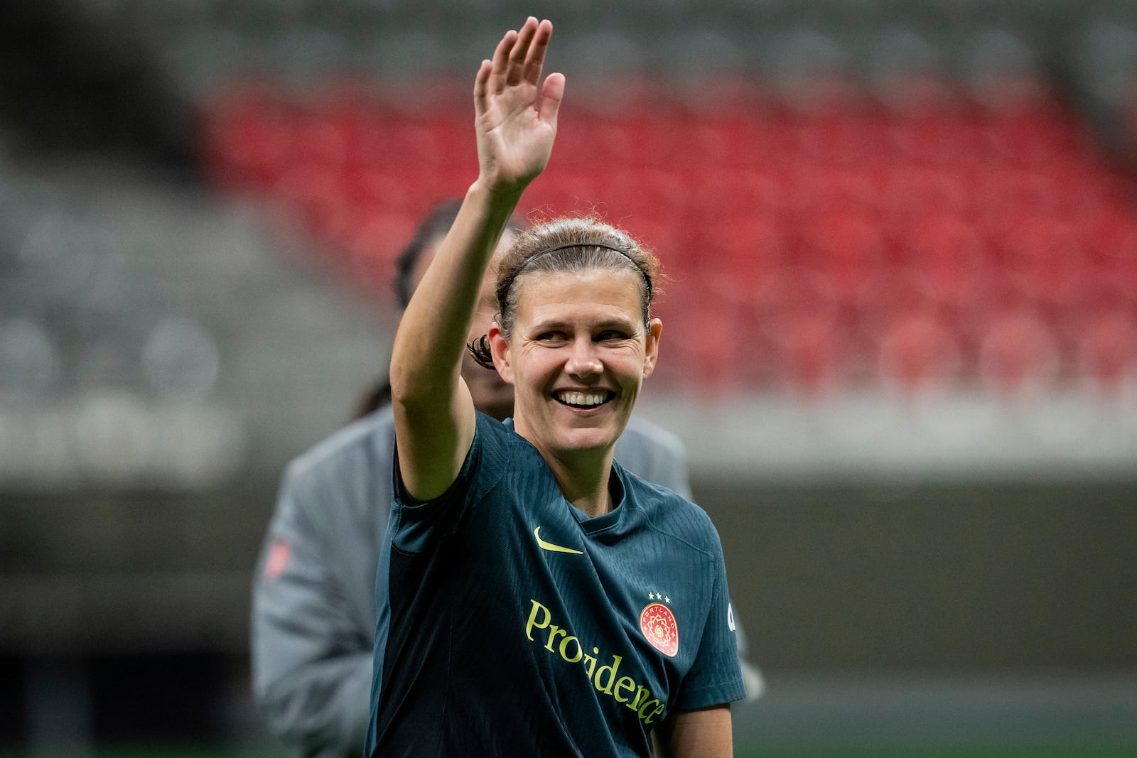 Portland Thorns FC's Christine Sinclair waves to fans after playing against the Vancouver Whitecaps in Vancouver, British Columbia, Tuesday, Oct. 15, 2024. (Ethan Cairns/The Canadian Press via AP)