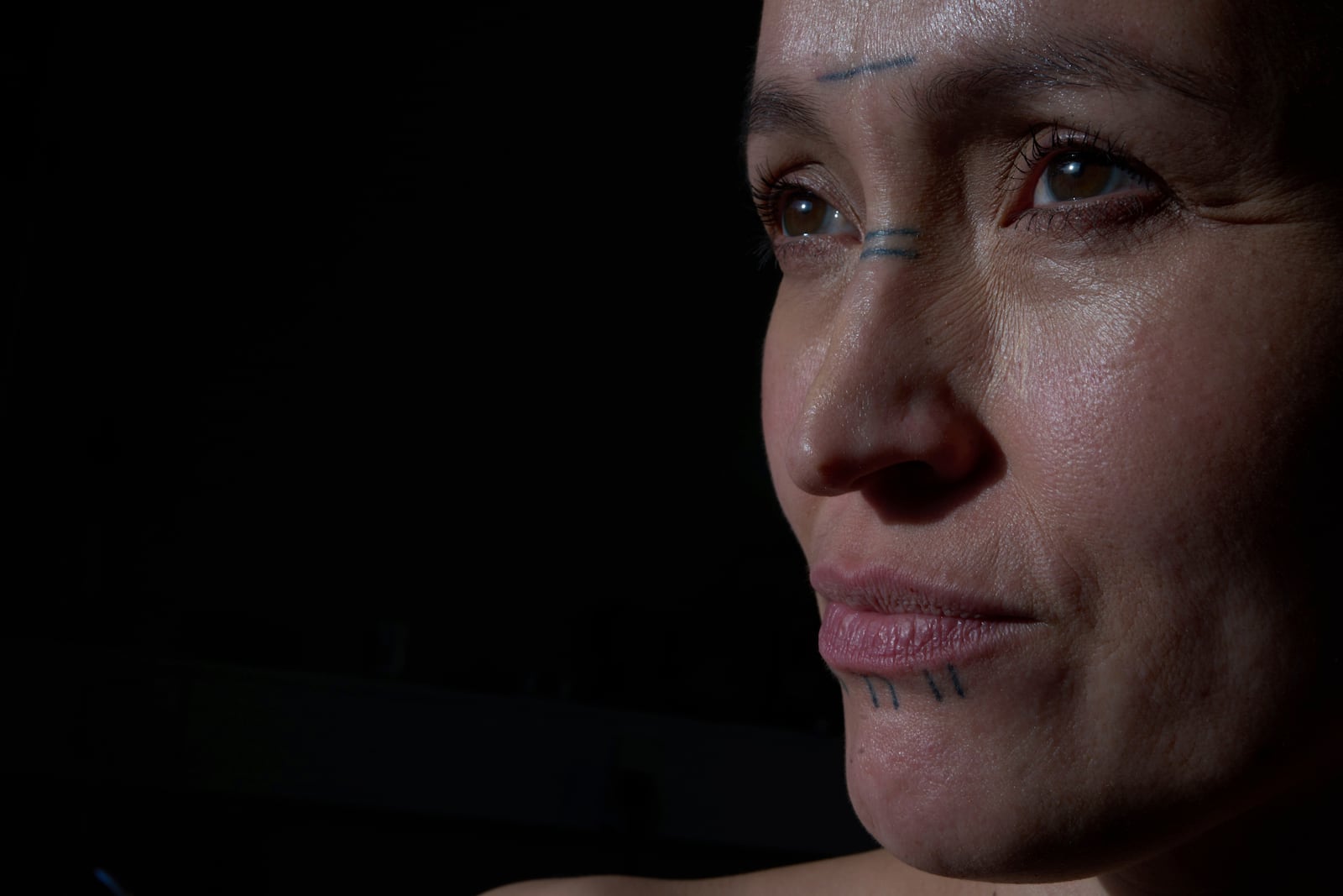 Aviaja Rakel Sanimuinaq, an angakkoq or shaman, poses for a portrait where she performs soul healing in Nuuk, Greenland, on Wednesday, Feb. 19, 2025. (AP Photo/Luis Andres Henao)