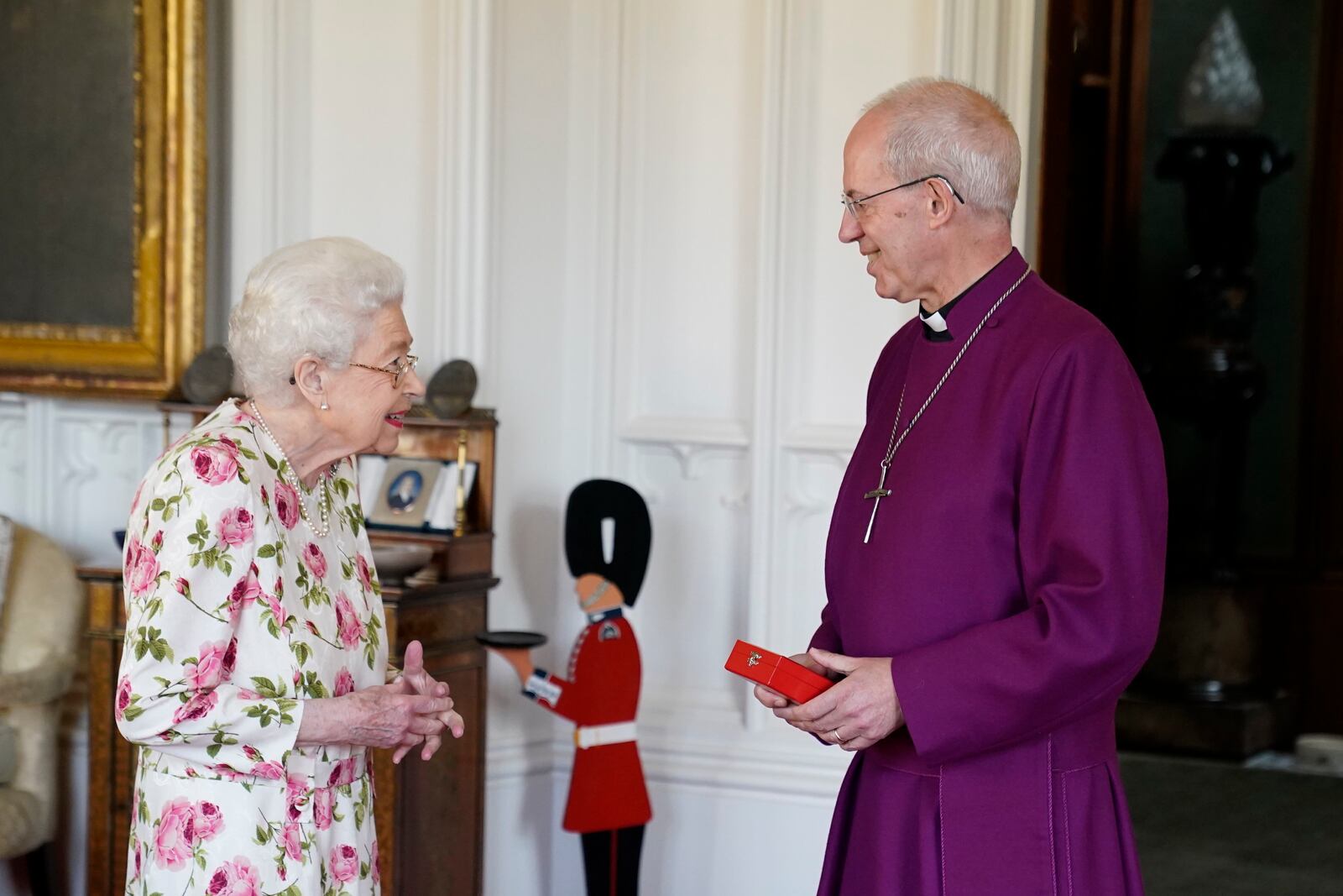 FILE - Britain's Queen Elizabeth II receives the Archbishop of Canterbury Justin Welby at Windsor Castle, Windsor, England, Tuesday June 21, 2022, where he presented the Queen with a special 'Canterbury Cross' for her unstinting service to the Church of England over seventy years and a citation for the Cross, which was presented as a framed piece of calligraphy. (Andrew Matthews/Pool via AP, File)