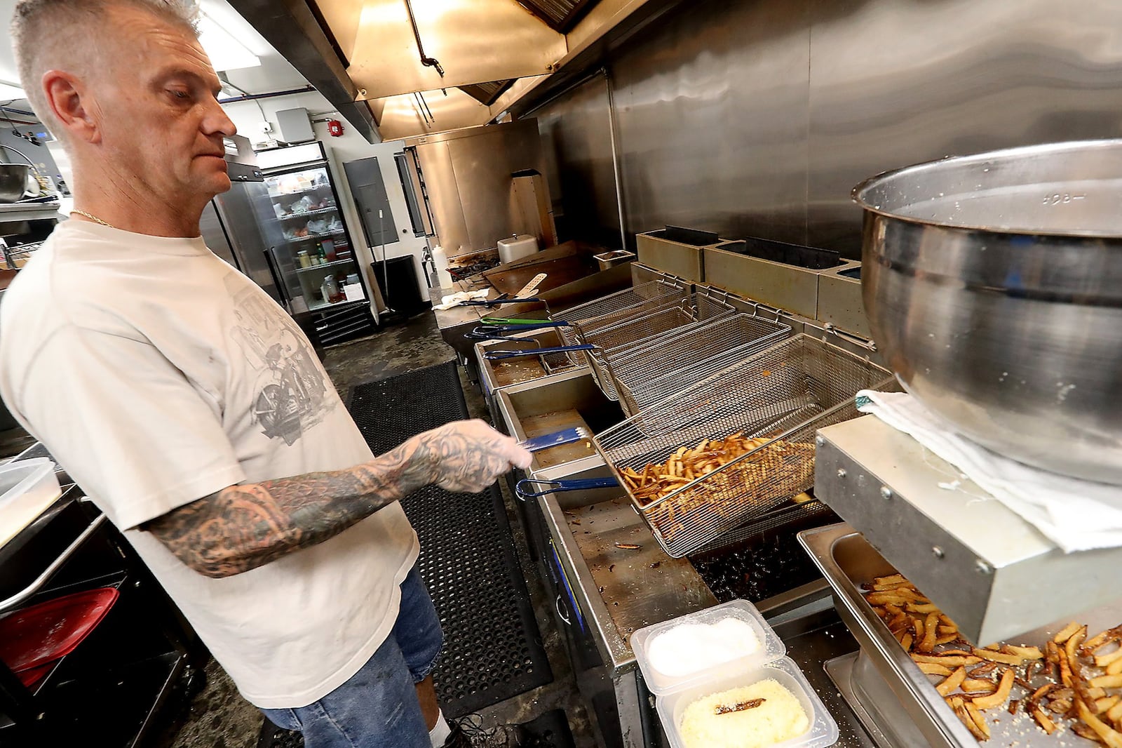 Dave Crook, the head cook at the Lincoln & Main Gastropub. BILL LACKEY/STAFF