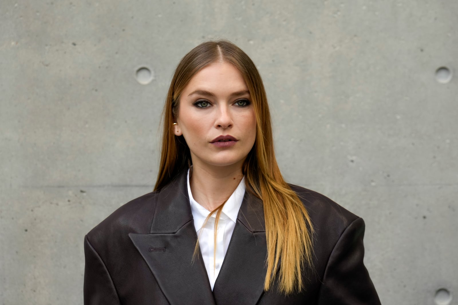 Camille Razat poses for photographers upon arrival at the Emporio Armani Fall/Winter 2025-2026 Womenswear collection presented in Milan, Italy, Thursday, Feb. 27, 2025. (AP Photo/Luca Bruno)