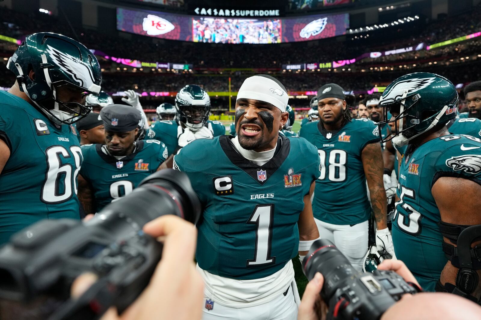 Philadelphia Eagles quarterback Jalen Hurts (1) huddles up his teammates prior to the NFL Super Bowl 59 football game against the Kansas City Chiefs, Sunday, Feb. 9, 2025, in New Orleans. (AP Photo/Brynn Anderson)