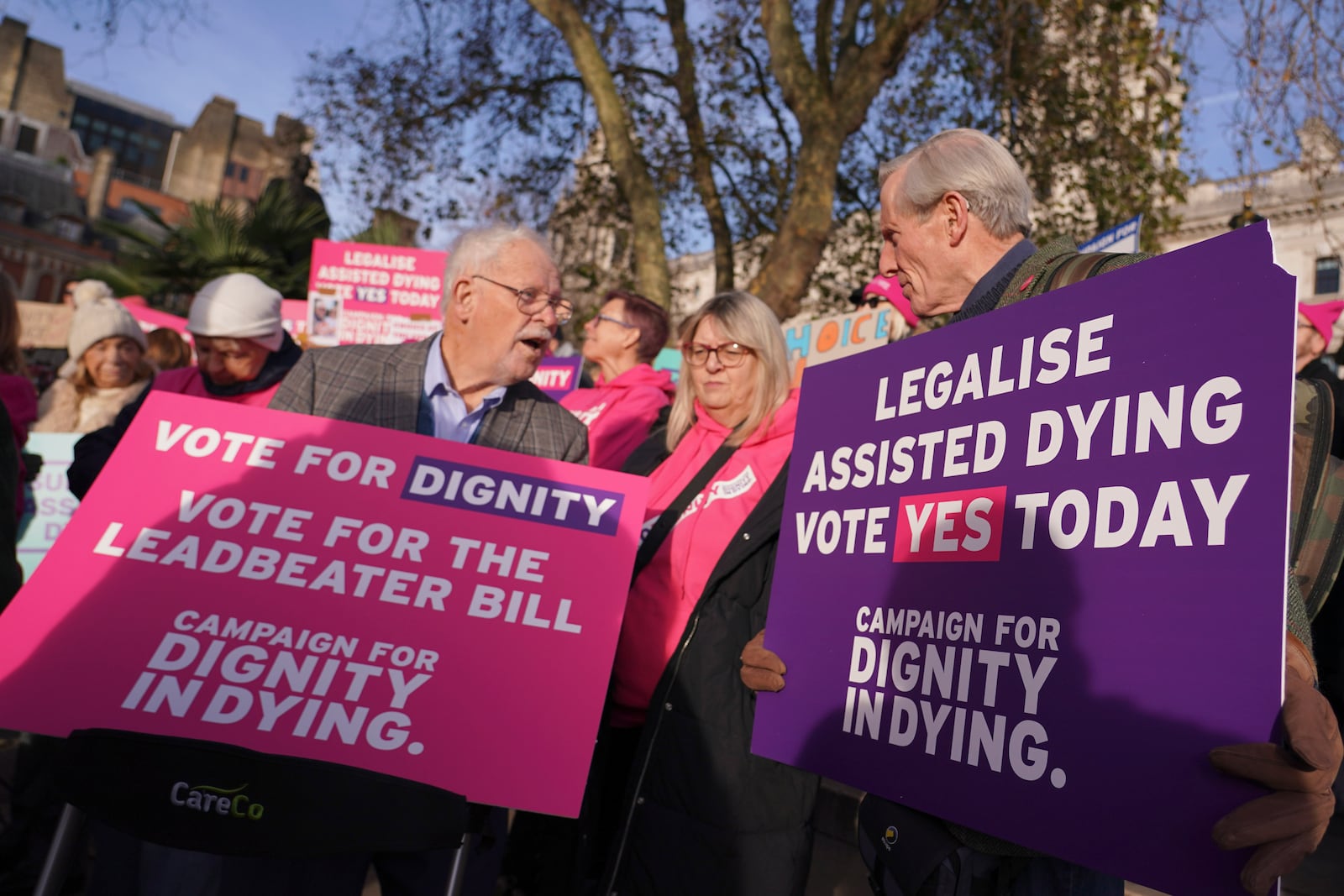 Pro legal assisted dying supporters demonstrate in front of Parliament in London, Friday, Nov. 29, 2024 as British lawmakers started a historic debate on a proposed to help terminally ill adults end their lives in England and Wales.(AP Photo/Alberto Pezzali)