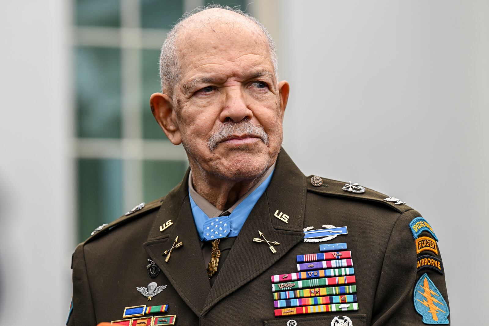 Retired Army Col. Paris Davis exits the White House after Biden awarded him the Medal of Honor for his heroism during the Vietnam War in Washington, March 3, 2023. While fighting in the Vietnam War in 1965, Davis performed a stunning series of heroic acts during an 18-hour battle, including dragging three wounded men to safety after he had been shot five times. (Kenny Holston/The New York Times)