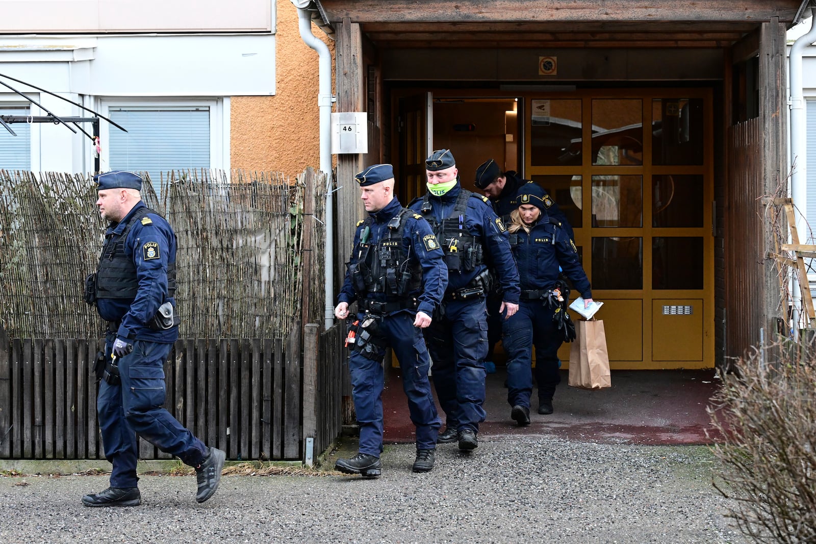 Police operations in Södertälje, south of Stockholm, Thursday Jan. 30, 2025, following the shooting of Salwan Momika in an apartment late last night. (Jonas Ekströmer/TT News Agency via AP)