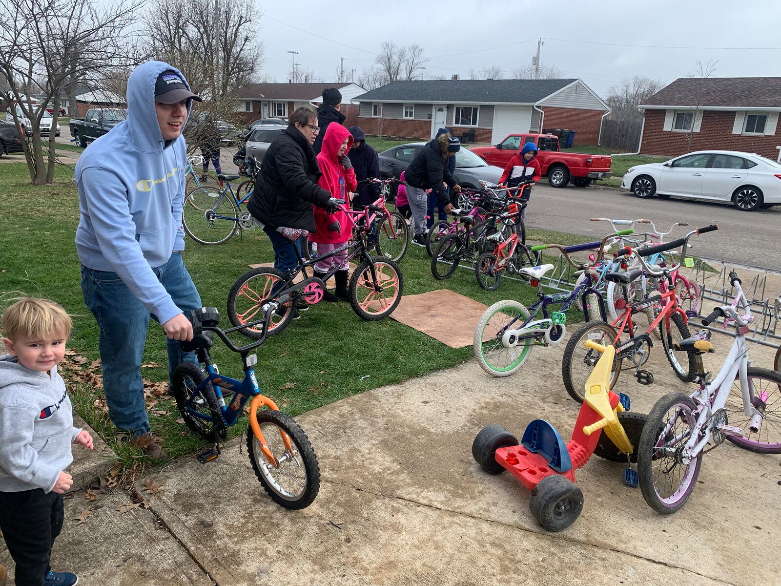 Crowds start to line up at David Nugent's house for one of his bike giveaway at his Brookville home. The line usually stretches down the street and around the block. CONTRIBUTED