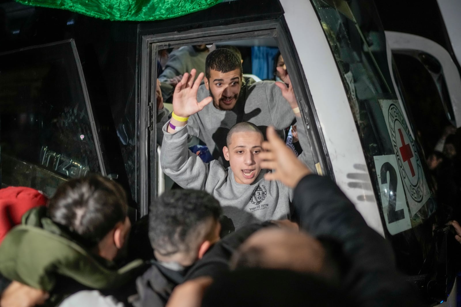 A Palestinian prisoner is greeted after being released from an Israeli prison, in the West Bank city of Beitunia, Jan. 20, 2025. (AP Photo/Leo Correa)