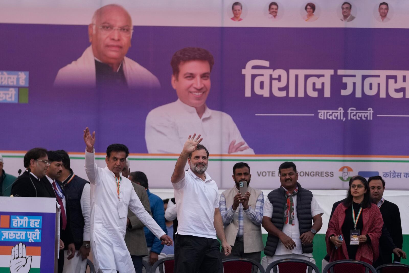 Congress party leader Rahul Gandhi, center, waves to his supporters during Delhi Assembly elections campaign rally in Delhi, India, Thursday, Jan. 30, 2025. (AP Photo/Channi Anand)