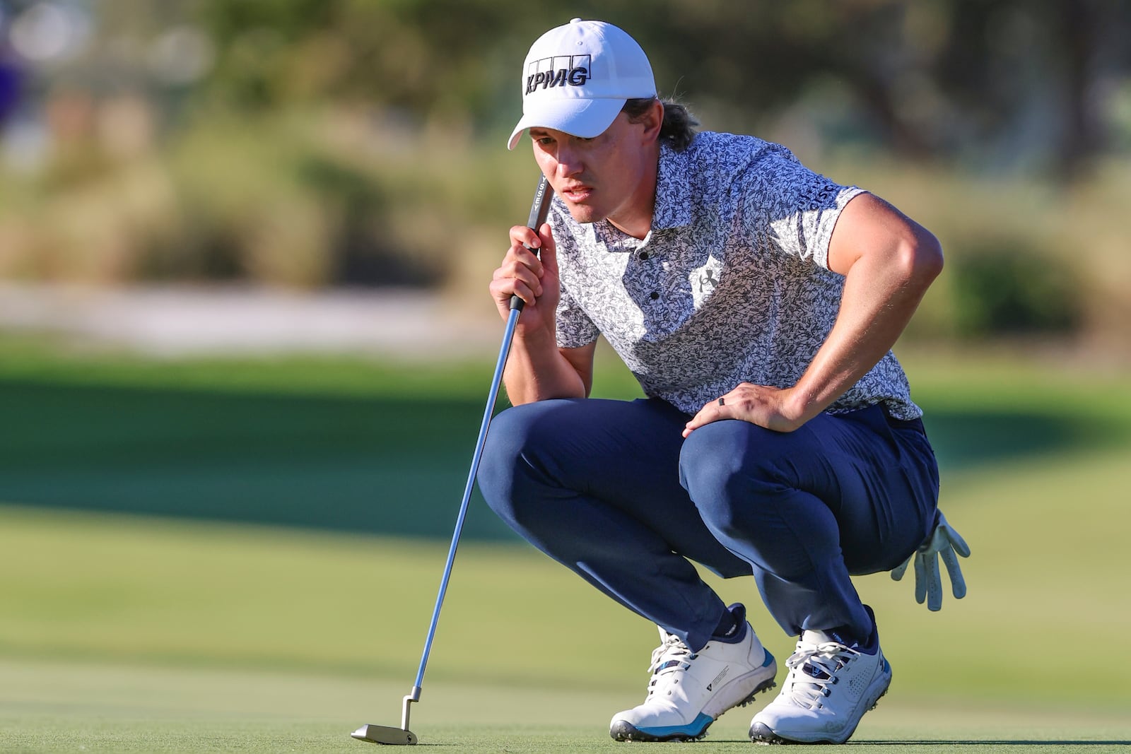 Maverick McNealy studies the 18th green during the final final round of the RSM Classic golf tournament, Sunday, Nov. 24, 2024, in St. Simons Island, Ga. (AP Photo/Gary McCullough)