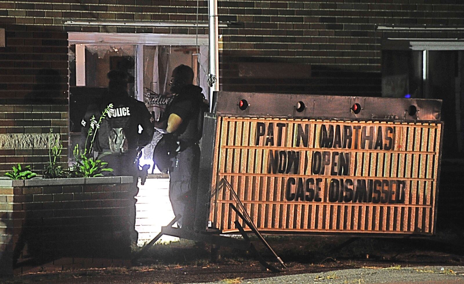 A standoff with a man who went into Pat & Martha’s Tavern Thursday night with a gun and threatened the owner ended after more than five hours. The man was found dead with an apparent self-inflicted gunshot wound. MARSHALL GORBY/STAFF