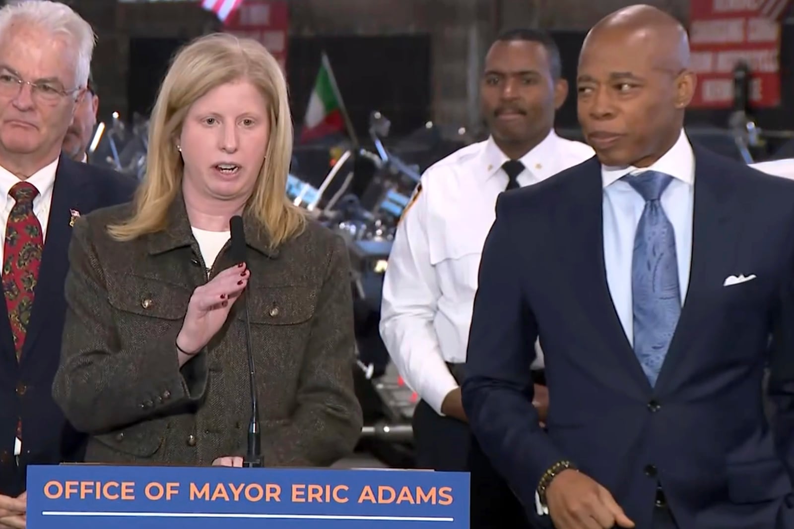 This image from video provided by Office of the New York Mayor shows New York City Police Commissioner Jessica Tisch, with New York Mayor Eric Adams, right, in the Staten Island borough of New York, Wednesday, Dec. 11, 2024, as she says the gun found on the suspect in the killing of United Healthcare's CEO matched shell casings found at the site of the shooting, and the suspect's fingerprints also matched a water bottle and a snack bar wrapper that police found near the scene in midtown Manhattan. (Office of the New York Mayor via AP)