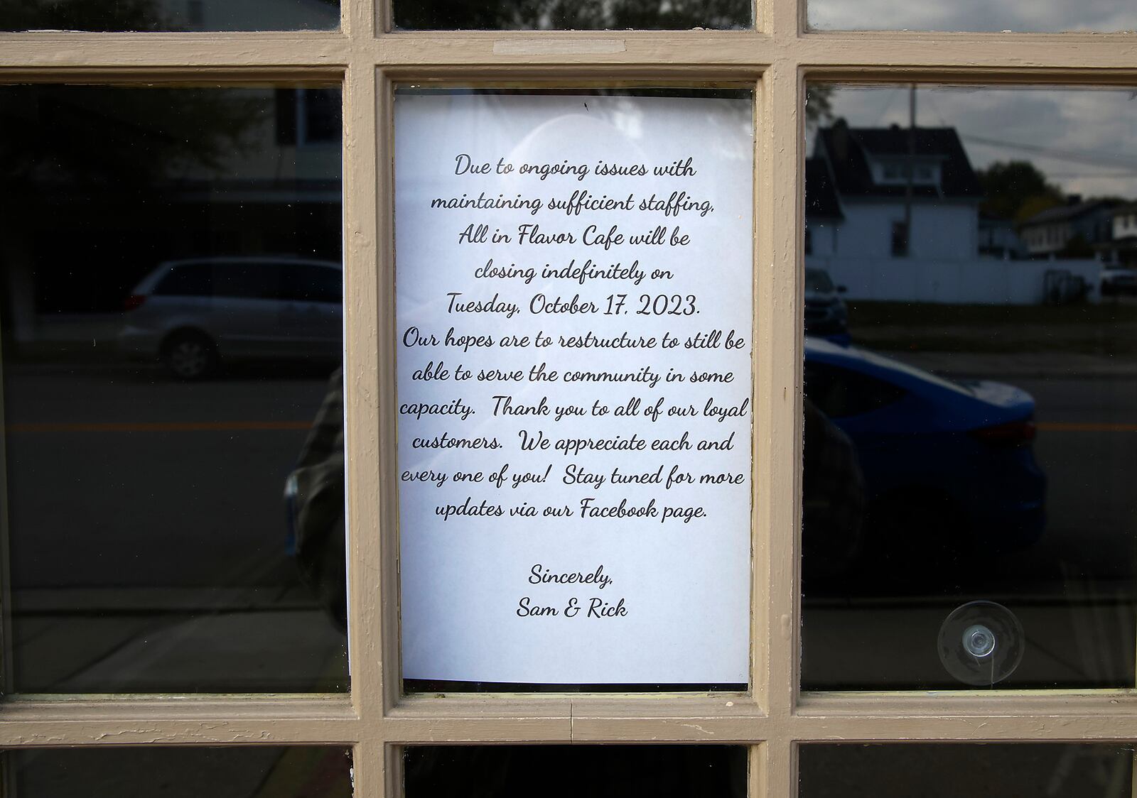 The sign on the door of All in Flavor Cafe & Sweets that announces that the South Charleston restaurant would be closing on Tuesday, Oct. 17, 2023. BILL LACKEY/STAFF