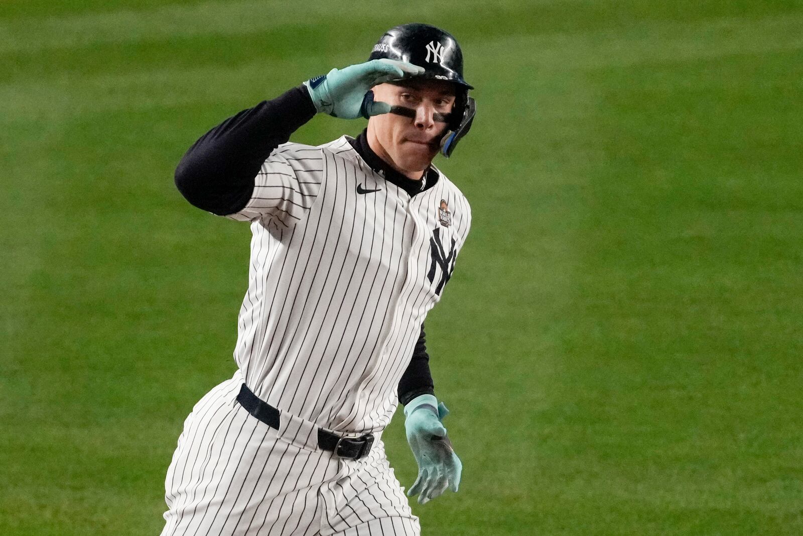 New York Yankees' Aaron Judge rounds the bases after a two-run home run against the Los Angeles Dodgers during the first inning in Game 5 of the baseball World Series, Wednesday, Oct. 30, 2024, in New York. (AP Photo/Frank Franklin II)