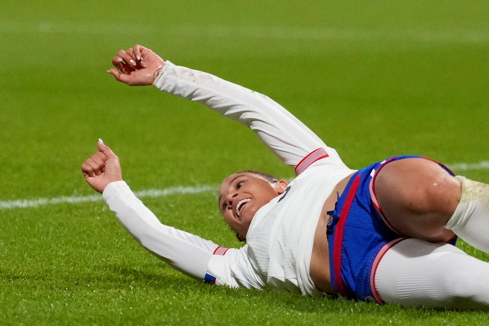 United States' Lynn Williams celebrates after scoring her side's second goal during the international friendly women's soccer match between the Netherlands and the United States at the ADO Den Haag Stadium in The Hague, Netherlands, Tuesday, Dec. 3, 2024. (AP Photo/Peter Dejong)