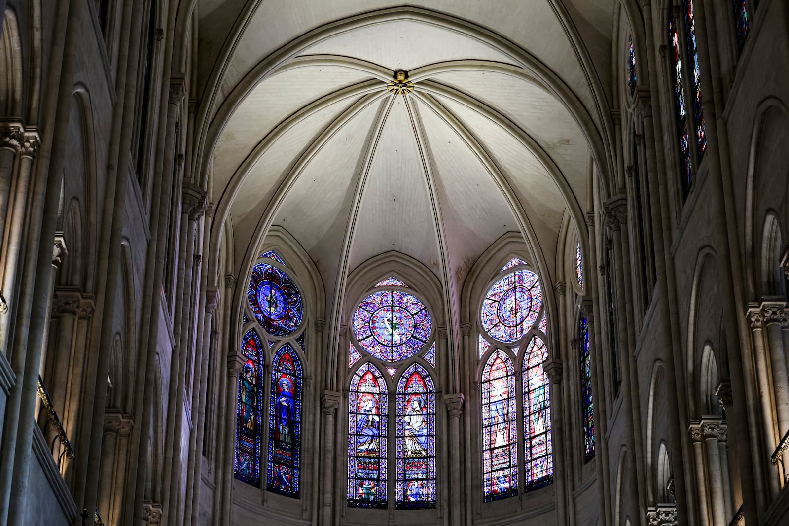 Windows in the heart of Notre-Dame de Paris cathedral are seen while French President Emmanuel Macron visits the restored interiors of the monument, Friday Nov. 29, 2024, in Paris. (Stephane de Sakutin, Pool via AP)