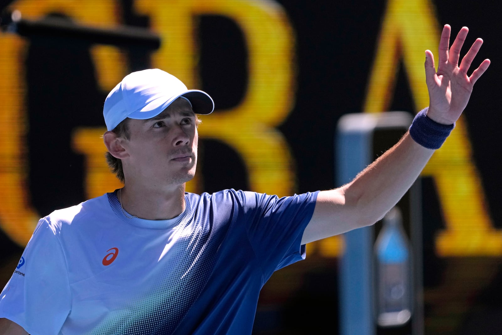 Alex de Minaur of Australia waves after defeating Tristan Boyer of the U.S. in their second round match at the Australian Open tennis championship in Melbourne, Australia, Thursday, Jan. 16, 2025. (AP Photo/Asanka Brendon Ratnayake)