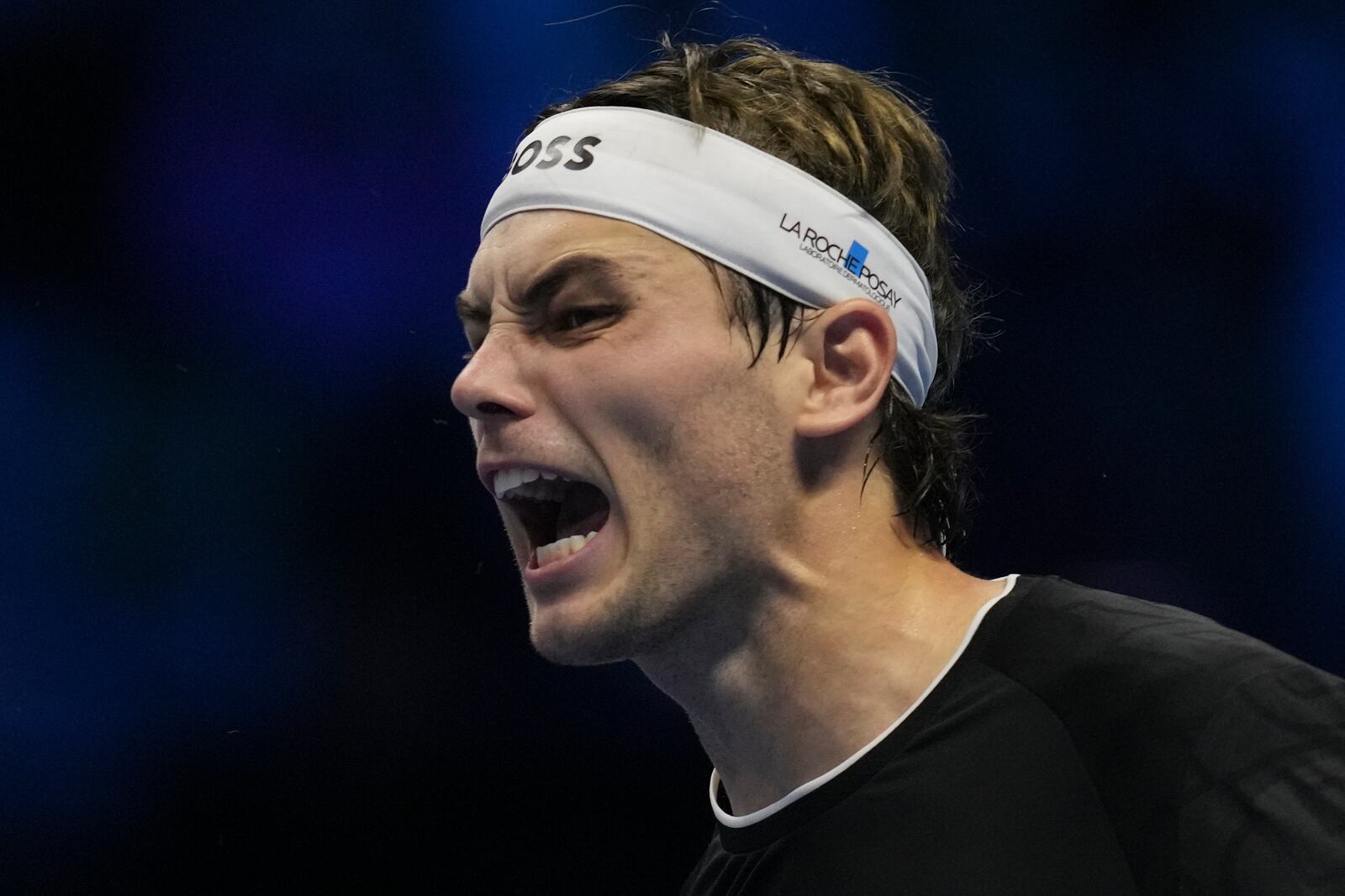 Taylor Fritz of the United States celebrates after winning the ATP World Tour Finals semifinal tennis match against Germany's Alexander Zverevat at the Inalpi Arena in Turin, Italy, Saturday, November 16, 2024. (AP Photo/Antonio Calanni)