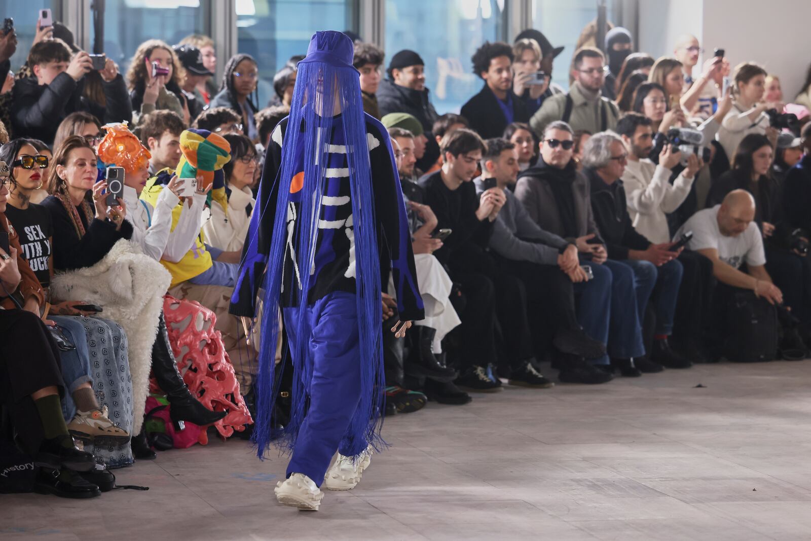 A model wears a creation as part of the men's Walter van Beirendonck Fall-Winter 2025-2026 collection, that was presented in Paris, Wednesday, Jan. 22, 2025. (AP Photo/Thomas Padilla).