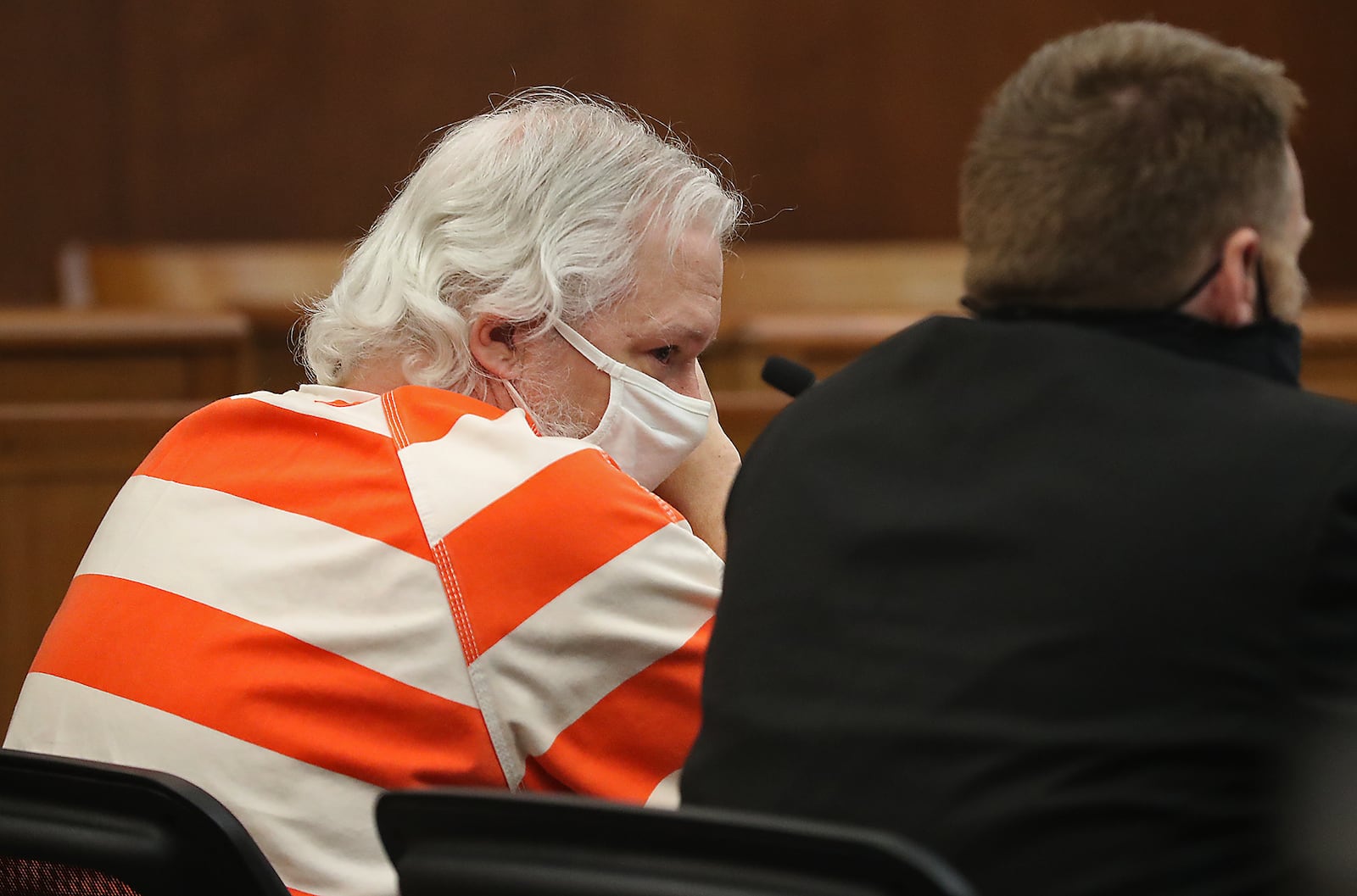 Rodney Rider sits with his attorney during his sentencing in Champaign County Common Pleas Court Monday. BILL LACKEY/STAFF